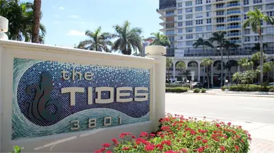a sign for the tides in front of a building at Miami HOLLYWOOD in Hollywood