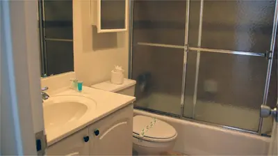 a bathroom with a shower and a sink and a toilet at Miami HOLLYWOOD in Hollywood