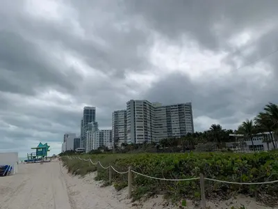 a sandy beach with tall buildings in the background at Dream Studio on the Beach in Miami Beach