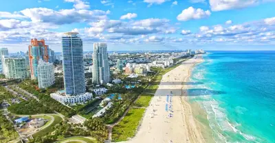 an aerial view of a beach and the ocean at Oceanview Private Condo at The Setai -2401 in Miami Beach