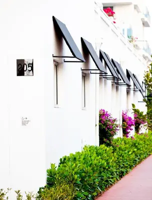 a row of lights on the side of a building at Blanc Kara- Adults Only in Miami Beach