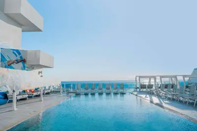 a swimming pool on a cruise ship at Hotel Maren Fort Lauderdale Beach, Curio Collection By Hilton in Fort Lauderdale