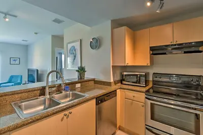a kitchen with a sink and a stove at Miami Apartment by Coral Gables - Great Location! in Miami