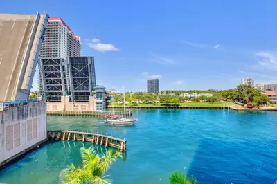 a river in a city with a boat in it at Luxury Amenities, Infinity Pool, Gym, Hot Tub in Hollywood