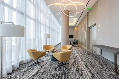 a lobby with chairs and a chandelier at Hyde Beach House Luxury Condo-Resort 1204 condo in Hollywood Beach