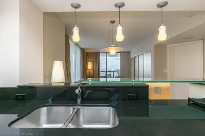a kitchen with a sink and a counter at 2 BR Luxury Suite in Marenas Beach Resort 2508 condo in Miami Beach