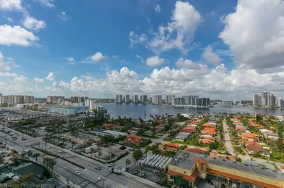 an aerial view of a city with a river and buildings at 2 BR Luxury Suite in Marenas Beach Resort 2508 condo in Miami Beach