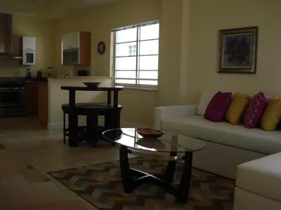 a living room with a couch and a table at Westover Arms Hotel in Miami Beach