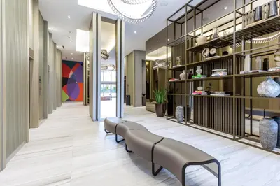 a lobby of a store with a row of benches at Family 3 bedroom Hyde Beach House Miami 22th floor in Hallandale Beach