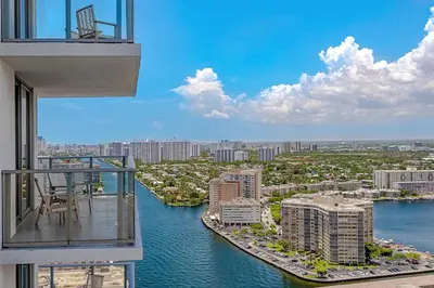 a view of a river from a balcony of a building at Luxury with stunning view, Balcony, Amazing Pools in Hollywood