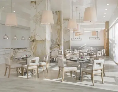a dining room with tables and chairs and chandeliers at Grand Beach Hotel Surfside in Miami Beach