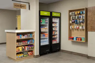 a store with two refrigerators in a grocery store at Home2 Suites By Hilton Miami Doral West Airport, Fl in Miami