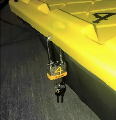 a black cat is attached to a yellow boat at Bposhtels Hollywood Florida in Hollywood