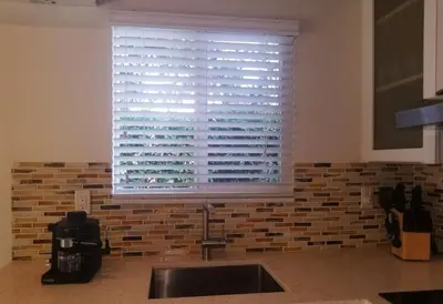 a kitchen sink with a window in a kitchen at LUXURY Guayabita's House in Miami