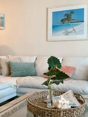 a living room with a couch and a table at Pavilion Beach Front Apartment with Balcony in Miami Beach