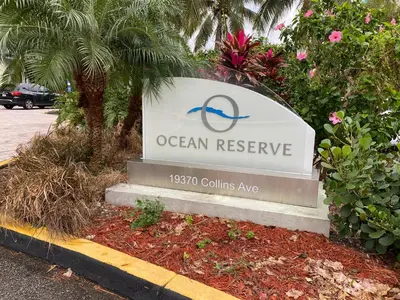a sign for an ocean reserve in a parking lot at Sunny Isles, beach life! Parking included in Miami Beach