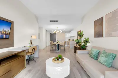 a living room with a couch and a table at Modern Resort - Terrace - Up To 6 - Near Beach in Hollywood