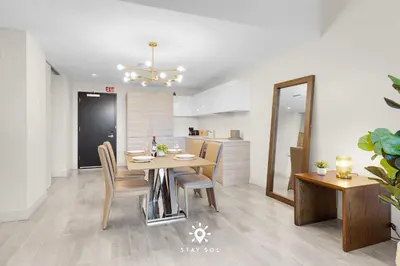 a dining room and kitchen with a table and chairs at Modern Resort - Terrace - Up To 6 - Near Beach in Hollywood