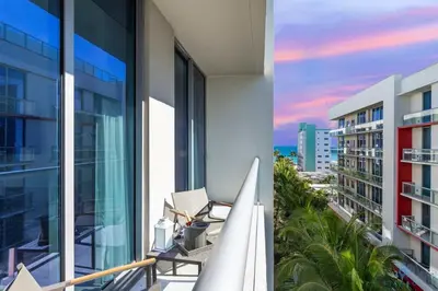 an apartment balcony with a view of the ocean at Perfect Relax - Hollywood Beach - Amazing Pool in Hollywood