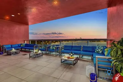 a large living room with blue couches and tables at Perfect Relax - Hollywood Beach - Amazing Pool in Hollywood