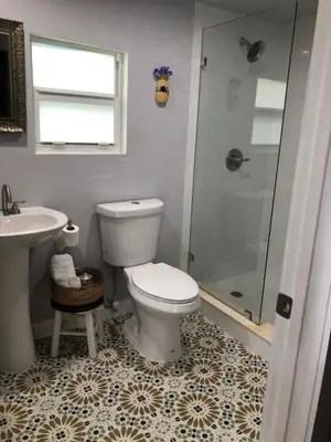a bathroom with a toilet and a shower and a sink at Private and Secluded Studio in Little Havana - 6V in Miami