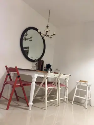 a white table with a mirror and two chairs at Private Studio blocks from Coconut Grove in Miami