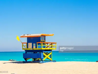a colorful lifeguard tower on the beach at 918 SOBE FLATS in Miami Beach