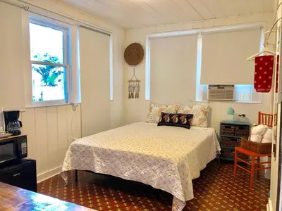 a bedroom with a bed and a window at Private Studio with Free Parking in Miami