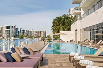 an image of a swimming pool at a resort at Luxury Condo with Jacuzzi and Amenities in Hollywood