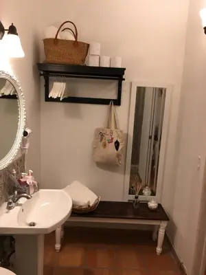 a bathroom with a sink and a mirror at Private Loft in the Heart of Little Havana in Miami