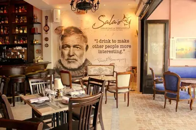 a restaurant with a picture of a man on the wall at Private Loft in the Heart of Little Havana in Miami
