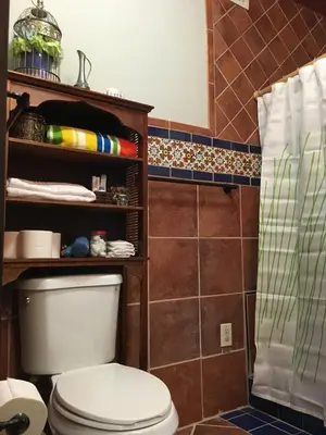 a bathroom with a toilet and a shower at Heavenly Suite in Little Havana Free Parking in Miami