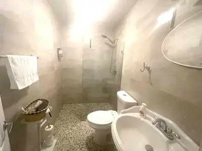 a small bathroom with a toilet and a sink at Stay Near Miami's Cultural Heart With Wifi in Miami