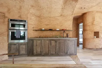 a kitchen with a sink and a stove at Casa Kawa lumicollection in Miami