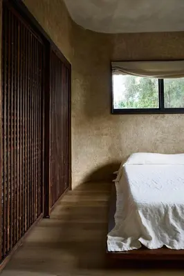 a bedroom with a bed and a window at Casa Kawa lumicollection in Miami