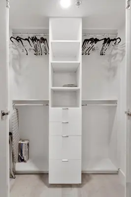 a white closet with white shelves in a room at Elite Brickell Studio on the Bay in Miami