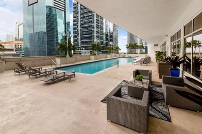 a swimming pool on the roof of a building at Elite Brickell Studio on the Bay in Miami