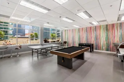 a gaming room with a pool table in it at Elite Brickell Studio on the Bay in Miami