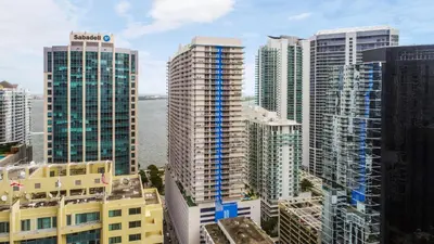 a group of tall buildings in a city at Elite Brickell Studio on the Bay in Miami