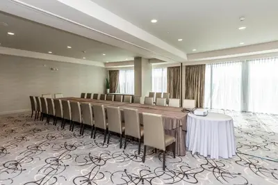 a conference room with a long table and chairs at Trump International Beach Resort Ocean View 1100 sf 1 Bed 1Bth Privately Owned Sunny Isles in Miami Beach