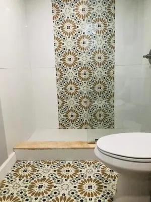 a bathroom with a toilet and a tiled shower at Independent Studio in Little Havana in Miami
