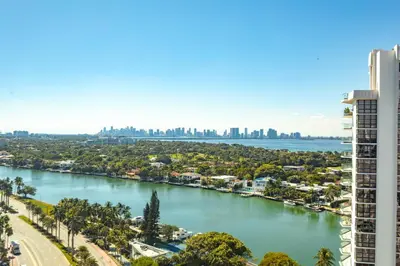 a view of a river with a city in the background at Girasole Suites in Miami Beach