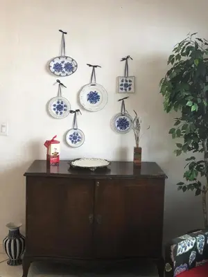 a cabinet with blue and white plates on the wall at Private Suite next to Calle Ocho in Miami