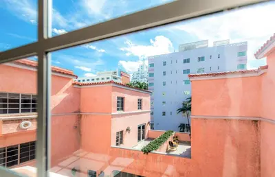 a view from a window of a building at Secret Garden Miami Beach in Miami Beach