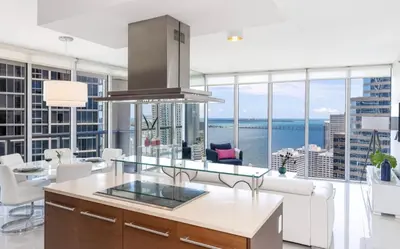 a kitchen with a view of the ocean at Icon Brickell Miami in Miami