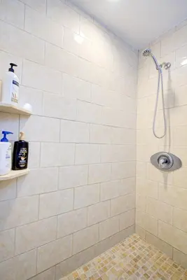 a bathroom with a shower with a sink at Efficiency 2 on water Las Olas, beach and free kayaks in Fort Lauderdale