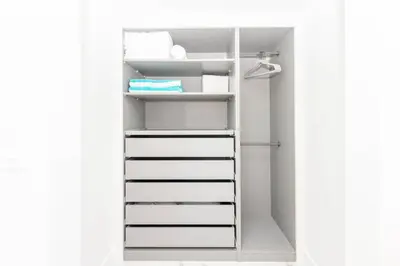 an open refrigerator with white shelves and a light at Yacht Club at Aventura Lux 2 Bed 2 Bath Brand New 2021 in Aventura