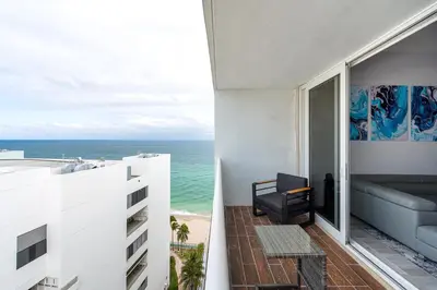 a balcony with a view of the ocean at AMAZING 2BR 2BA NEWLY RENO BEACHFRONT APT W/BEACH VIEW in Hollywood