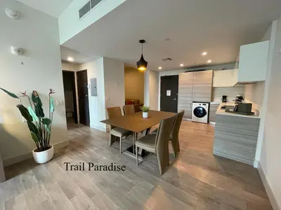 a dining room and kitchen with a table and chairs at COSTA HOLLYWOOD Steps to Beach in Hollywood