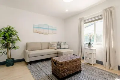 a living room with a couch and a table at Casa Madeira 2@ the heart of Miami Design District in Miami